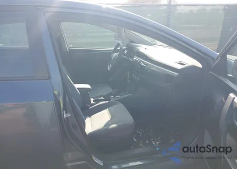 2015 Toyota Corolla L z USA, uszkodzony, nr VIN 2T1BURHEXFC266772